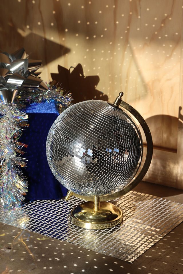 How to Pair Disco Balls with Vintage Furniture Pieces